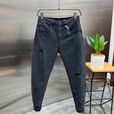 高端水洗刮烂破洞微锥小脚牛仔裤