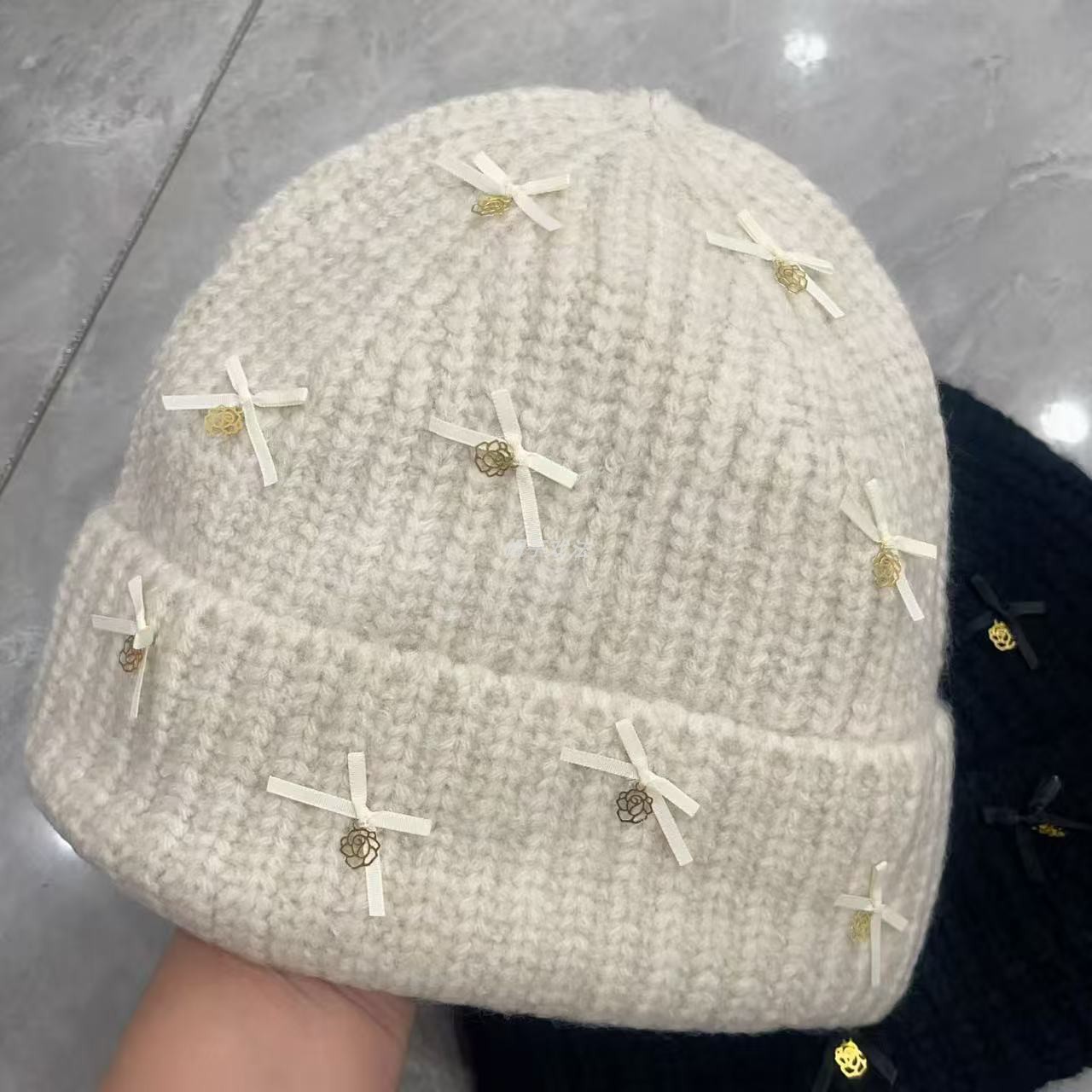 薄百搭保暖蝴蝶结小花羊毛显瘦韩版女宽松学生秋冬盖耳针织翻边帽