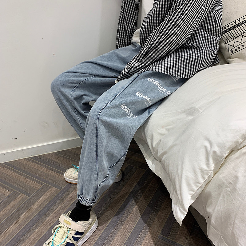 2023春款港风印花束脚牛仔裤货号K387P55图片