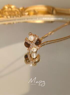 小众设计感四瓣花虎眼石项链