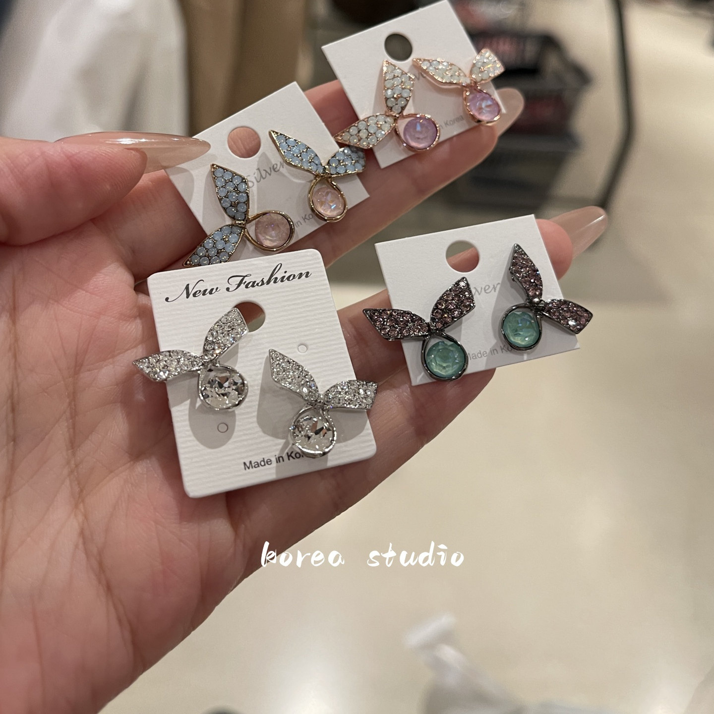 闪钻蝴蝶结宝石耳环精致灵动银针
