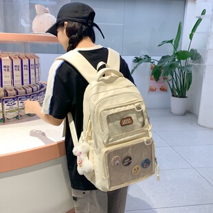 书包女设计感初中生高中学生痛包双肩包小学生大容量带透明层背包