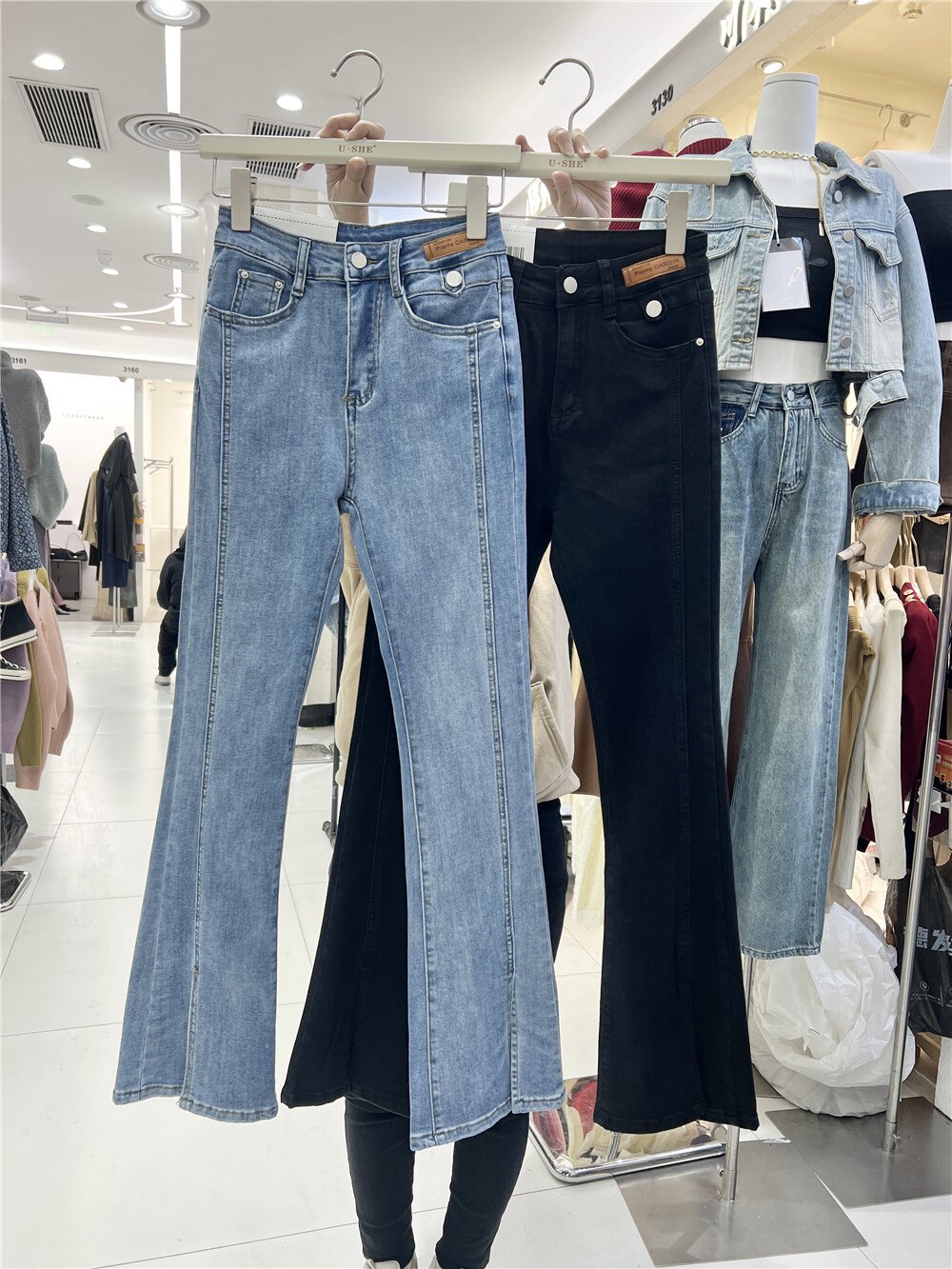 前开叉气质牛仔裤女2026春季新款高腰显瘦大码修身小个子微喇叭裤
