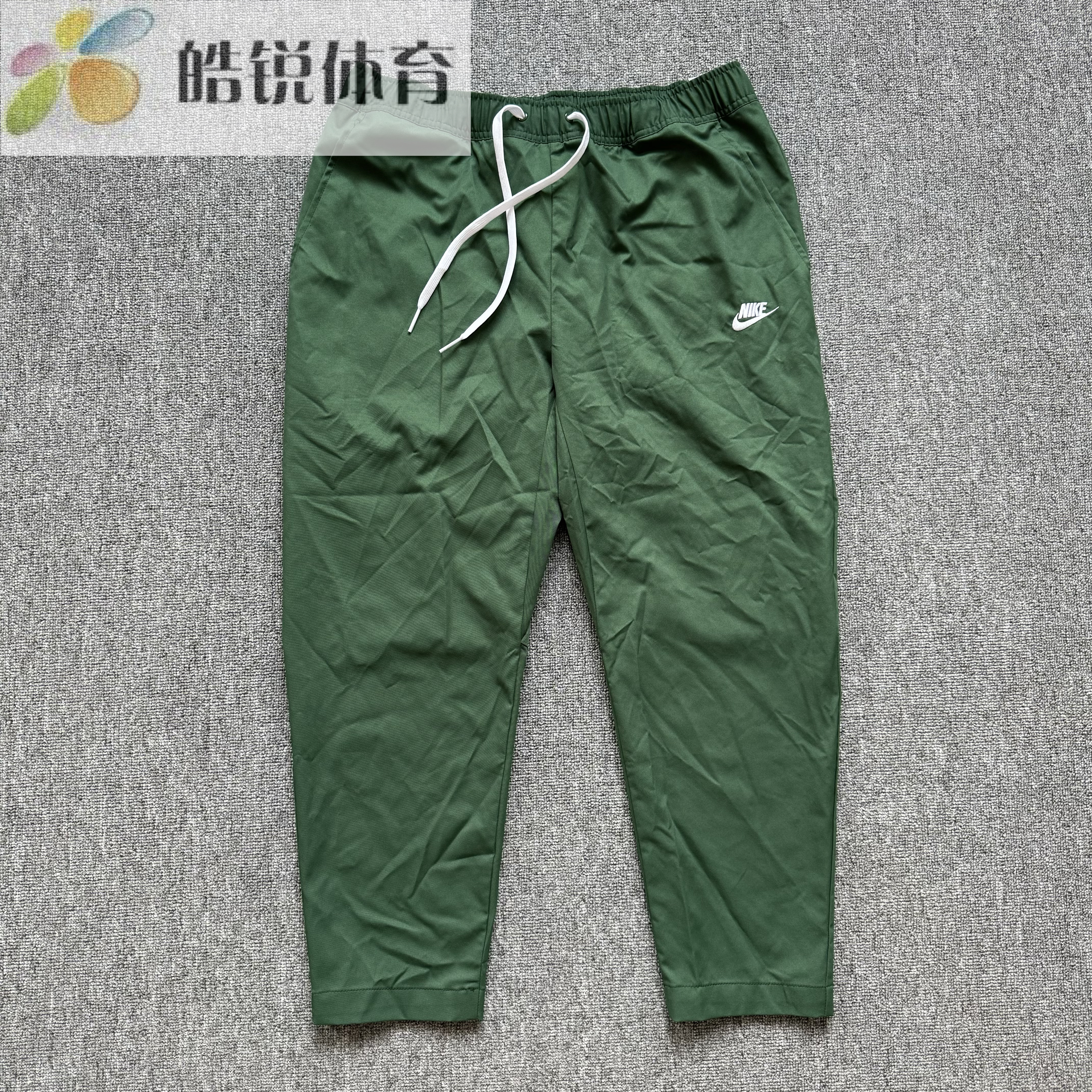 Nike 耐克男子刺绣梭织透气运动休闲束脚工装长裤 DX0625-323