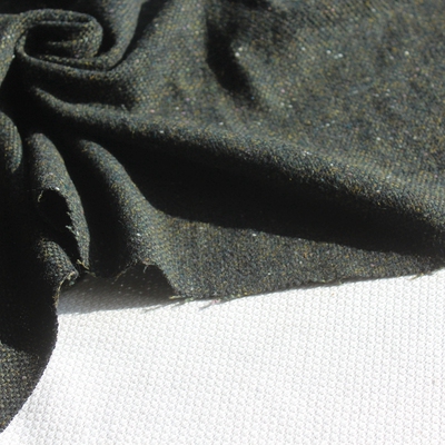 新品羊毛混纺布料墨绿色色织小点中厚秋冬服装面料140cm宽1米价