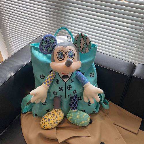 米奇双肩包2025新款时尚帆布大学生上课包卡通公仔可爱网红书包女