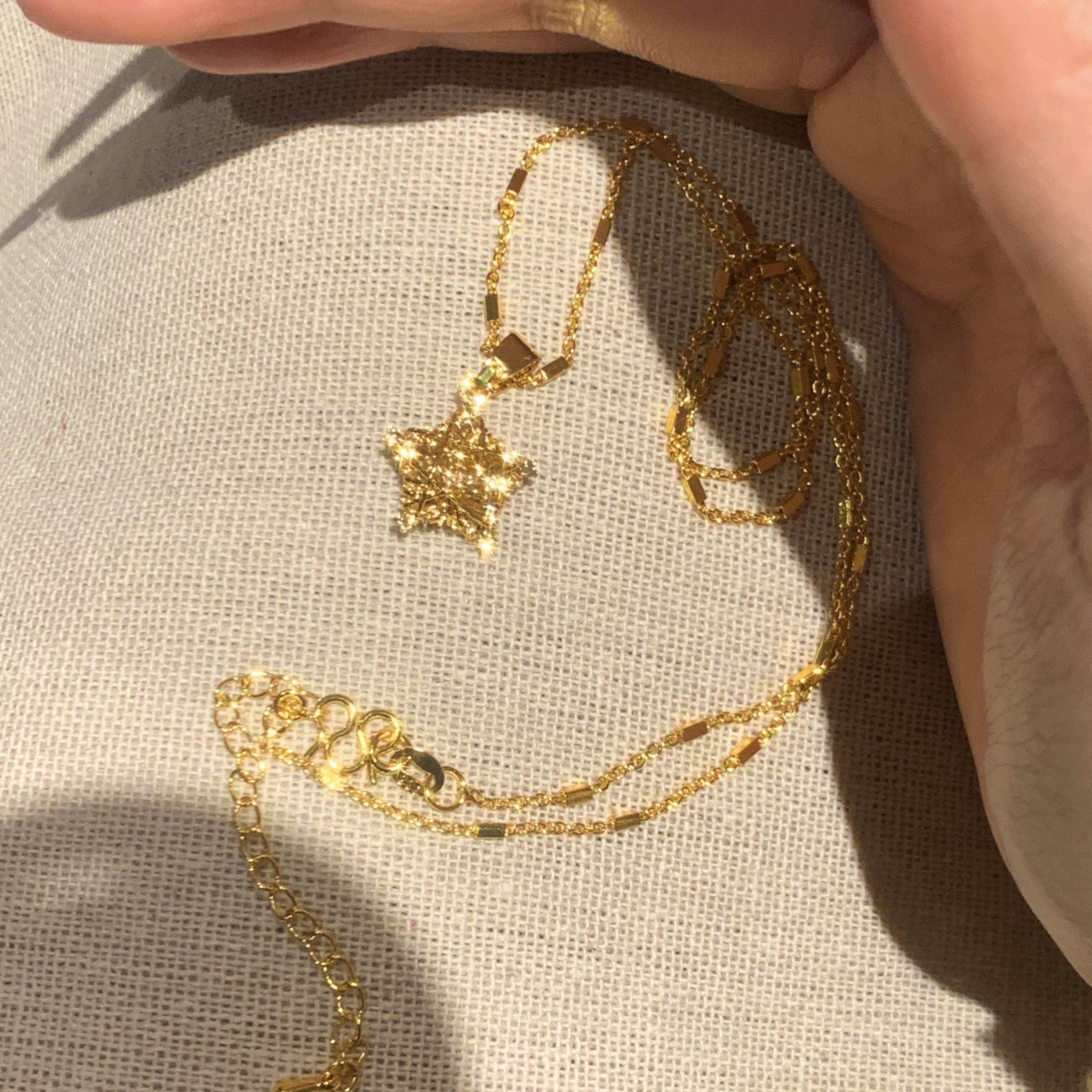 paula时序 新中式国潮风丨爆闪金色织梦星镂空星星项链 L025