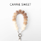 Carrie sweet毛球手机链秋冬毛绒挂链便携高级感手腕手机链挂饰