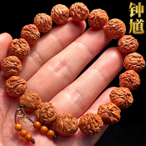 龙纹桃核雕刻钟馗手串
