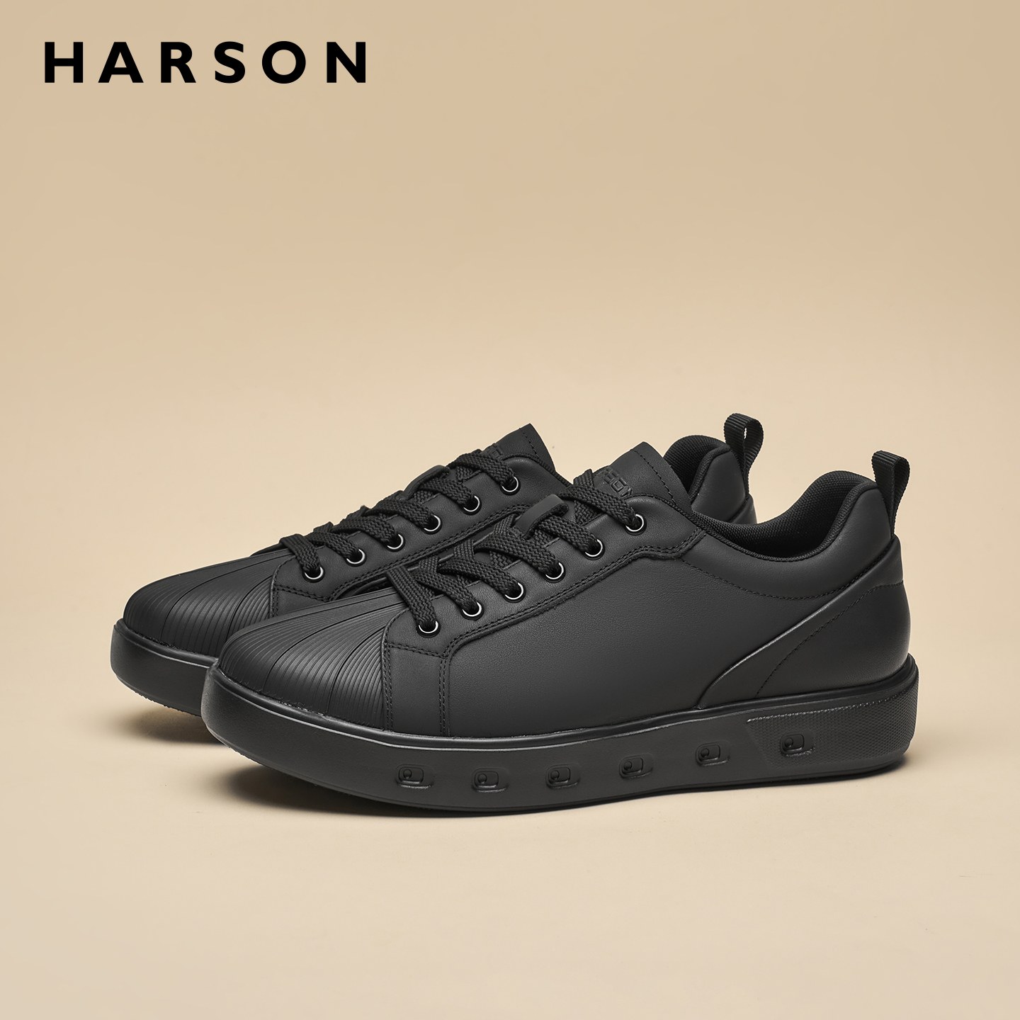 哈森男鞋秋季新款黑色贝壳头板鞋