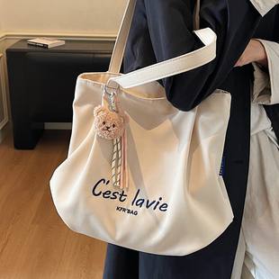 休闲简约帆布包女式2026新款秋季大容量学生上课单肩托特包通勤包