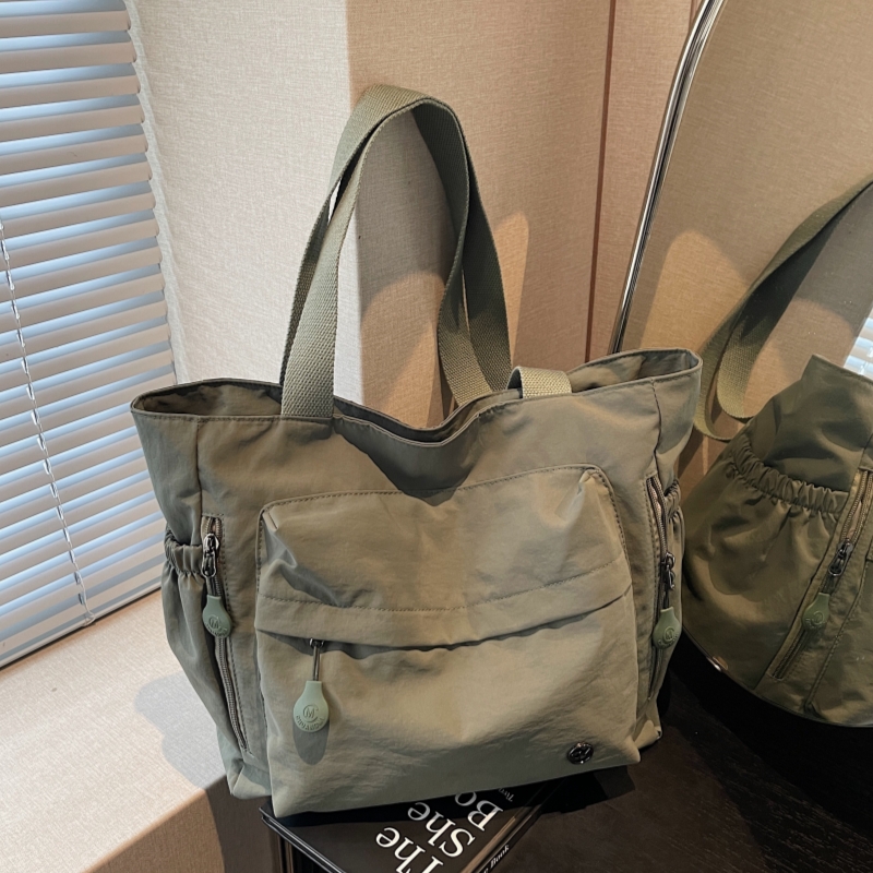 大容量布袋包包女2025新款托特包上班通勤单肩休闲学生上课手提袋