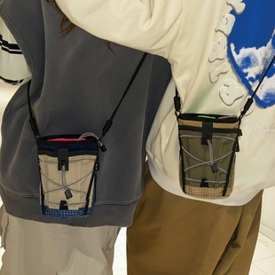 外出便携小挎包户外运动斜挎包男女抽绳小布包轻便通勤单肩水杯包