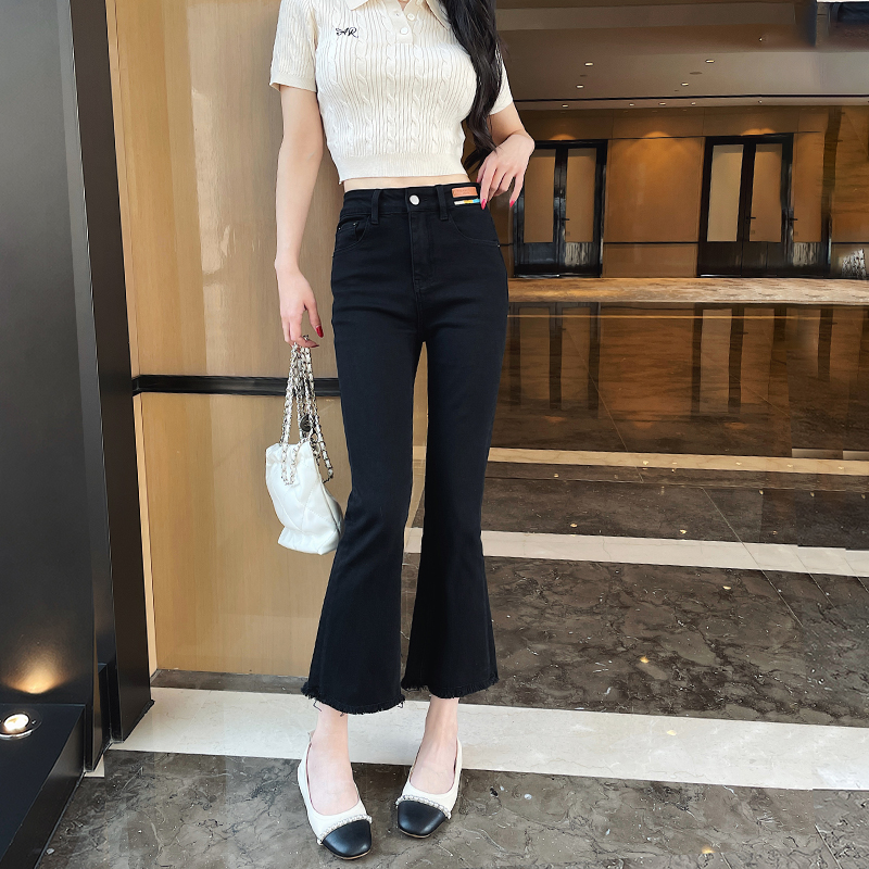 黑色流苏毛边九分微喇牛仔裤女
