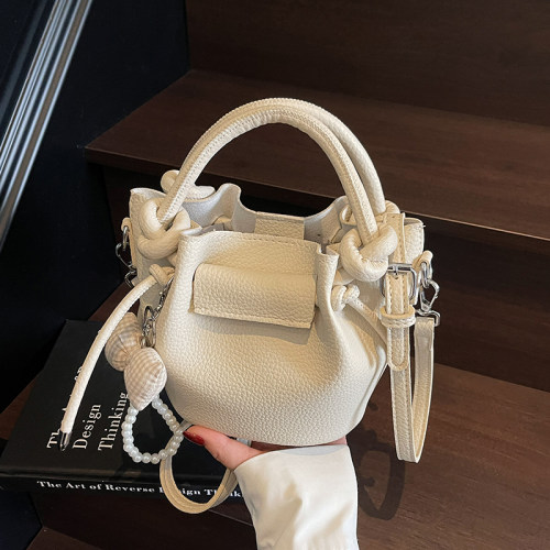 荔枝纹手提水桶包软皮褶皱斜挎包