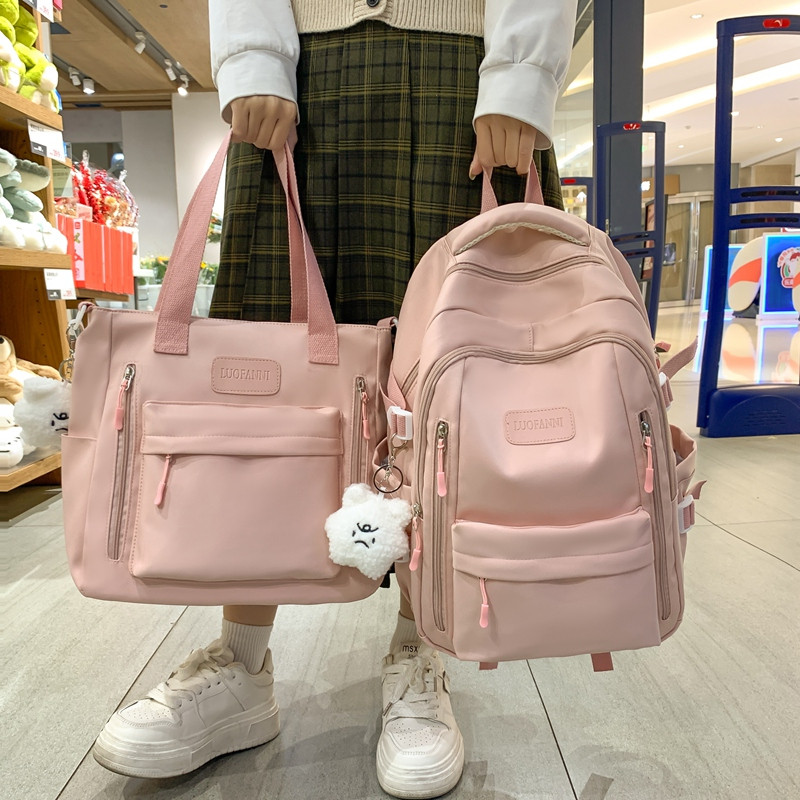 减负护脊超轻便书包初中女生小学生三到六年级大容量高中生双肩包