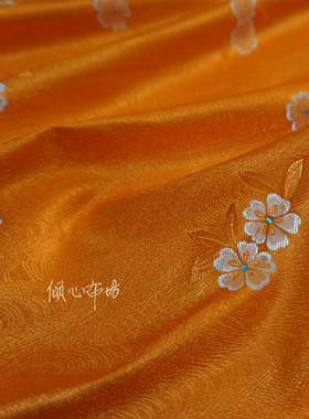 桔色橘橙色桃花潭水素面织锦缎布料 丝绸缎子面料云宋锦旗袍汉服
