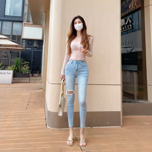 浅蓝高腰破洞显瘦提臀小脚牛仔裤