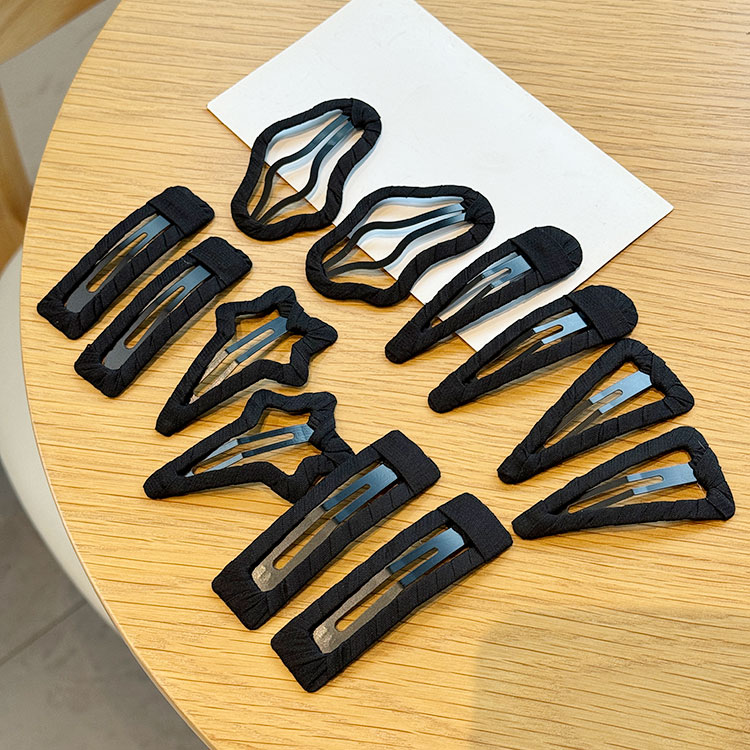 镂空五角星水滴黑色缠布边夹发夹