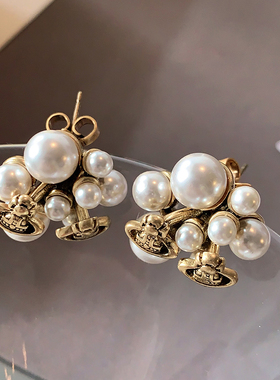 西太后花朵珍珠耳钉2026新款爆款土星耳环女轻奢高级感小香风耳饰