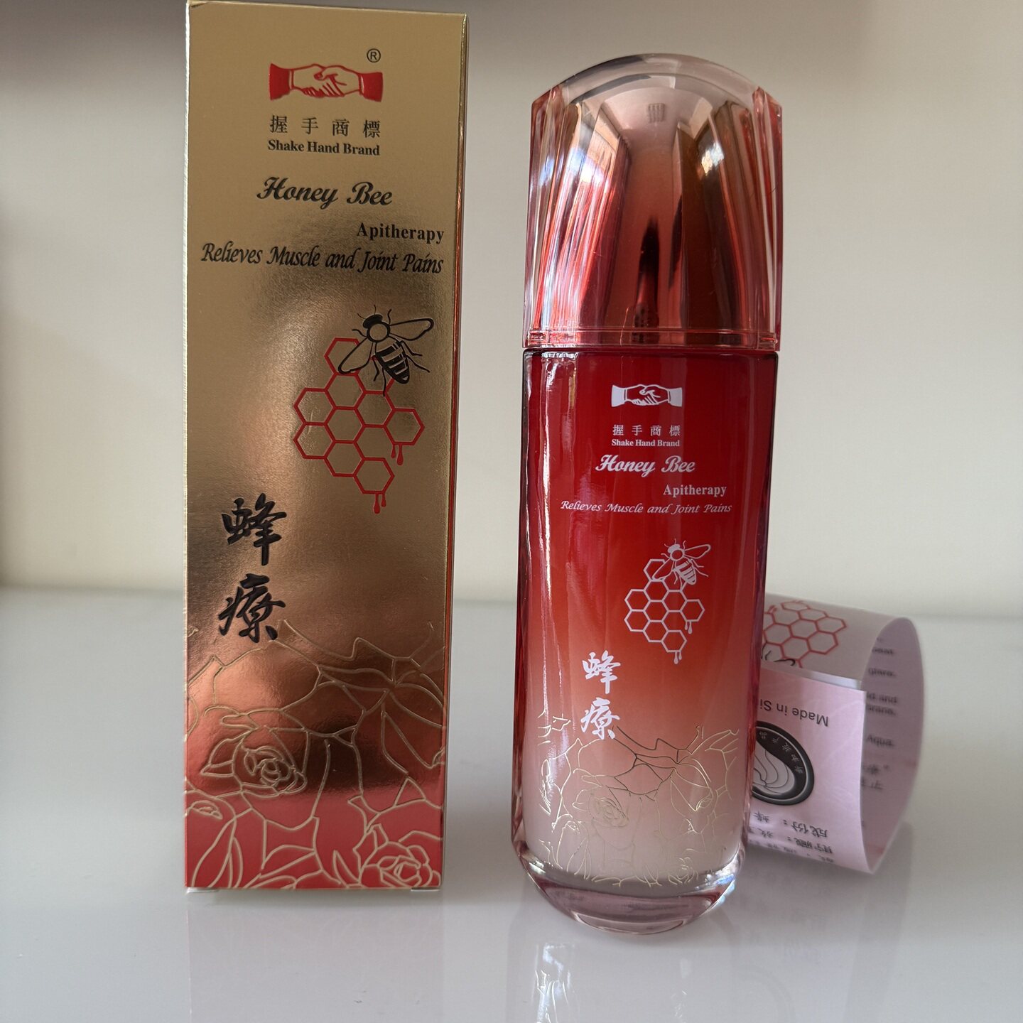 握手商标新加坡蜂疗华安出品