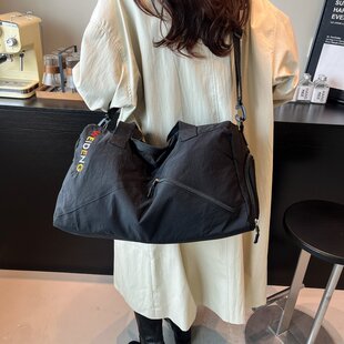 休闲大容量包包女式2025新款潮流行布包短途旅行手拎包单肩斜挎包