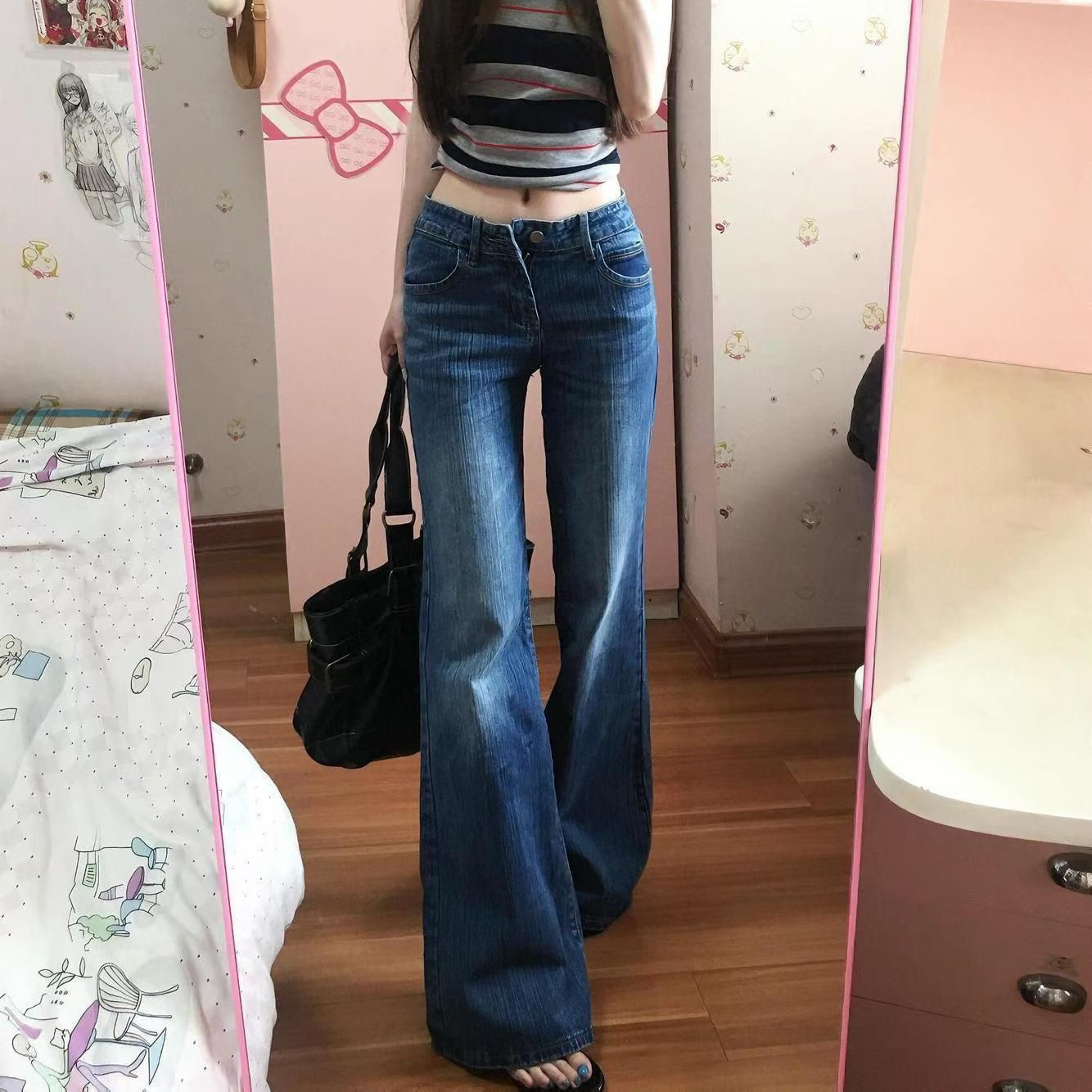 美式水洗深蓝色低腰微喇牛仔裤女2026春夏新款辣妹拖地直筒微喇裤