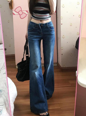 美式水洗深蓝色低腰微喇牛仔裤女2026春夏新款辣妹拖地直筒微喇裤