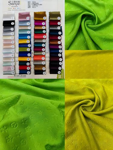 国潮设计连衣裙压花面料知绫纺织