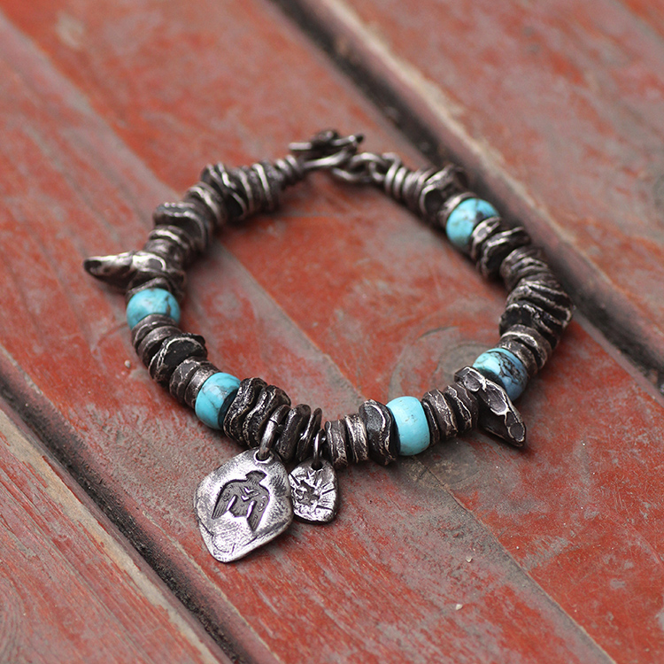 跋折罗原创游牧风银盘缠虎牙手链