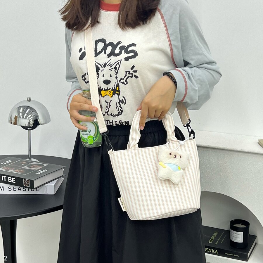 沐里沐气新款格纹手提袋女轻便休闲单肩斜挎包百搭帆布包水桶包