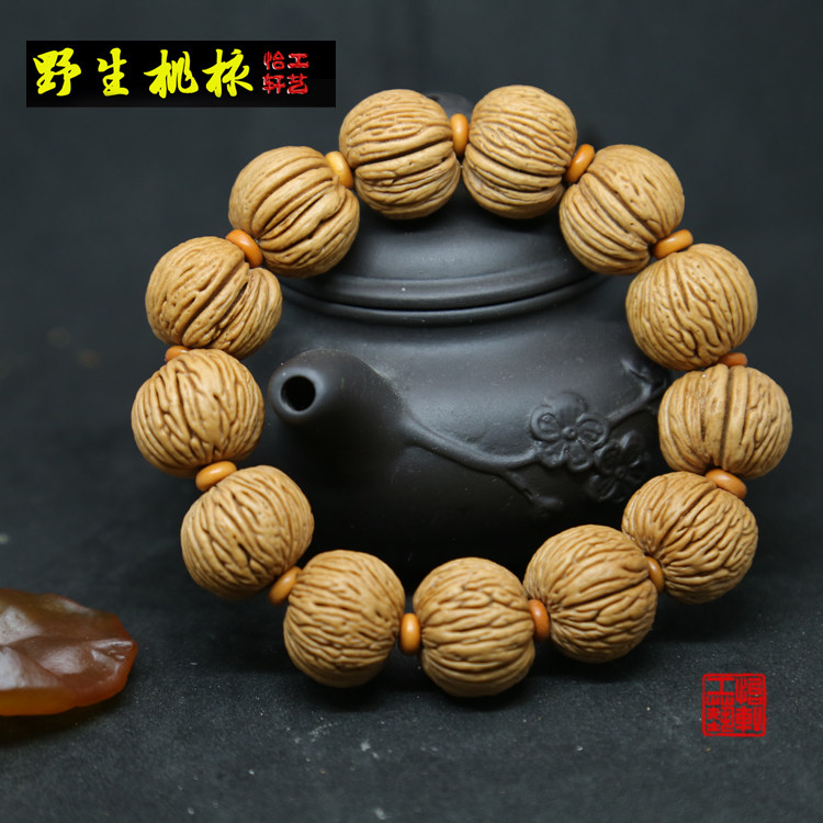 怡轩工艺特色桃核手串