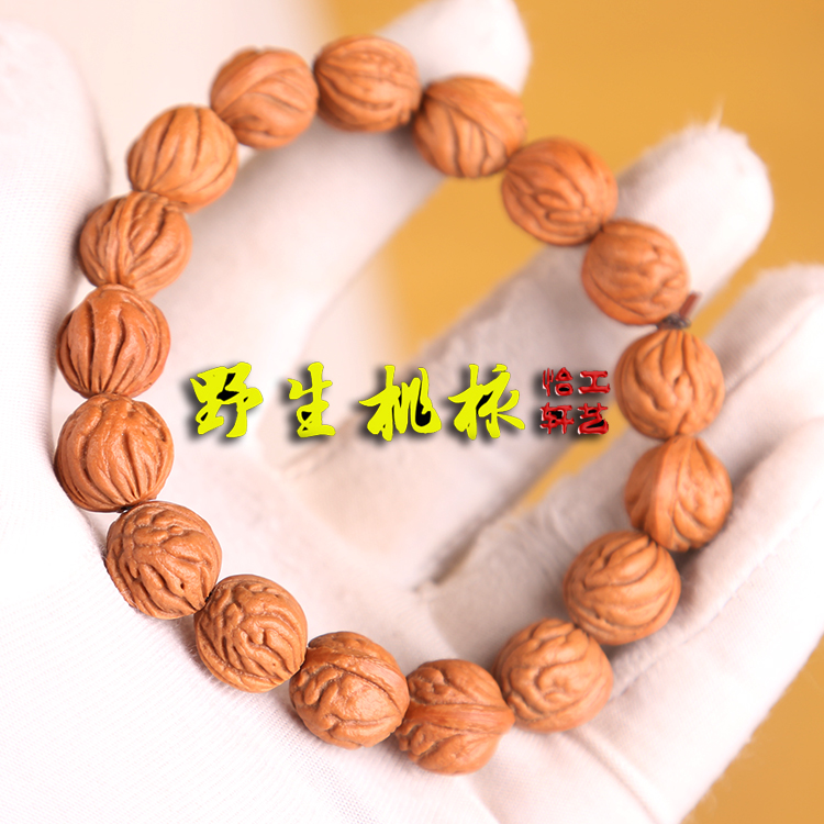 精品小龙纹桃核手串秦岭野生大肚子男款女款金鱼肚桃胡佛珠长串