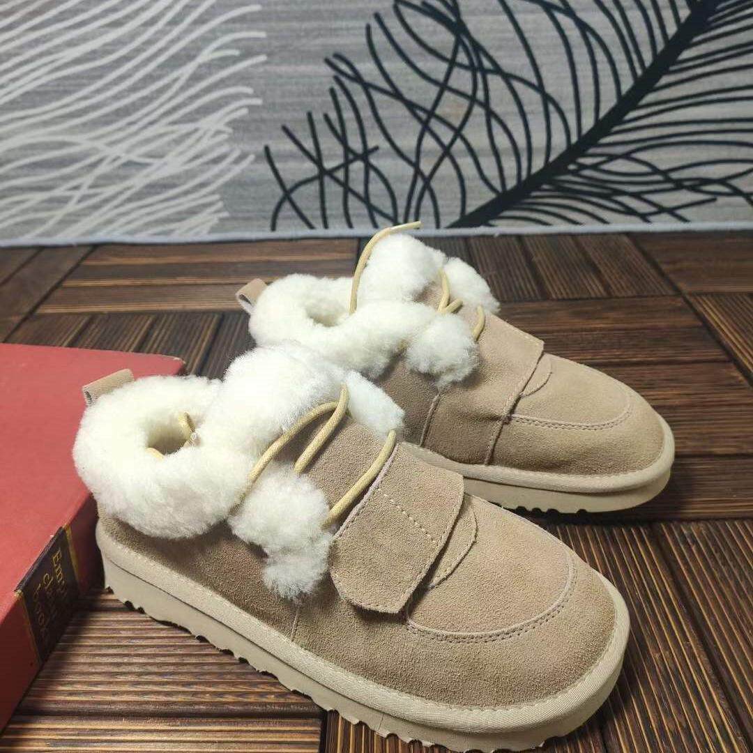 冬季新款真皮羊毛女士雪地靴 平跟圆头保暖靴子 小丑鞋套脚24-5