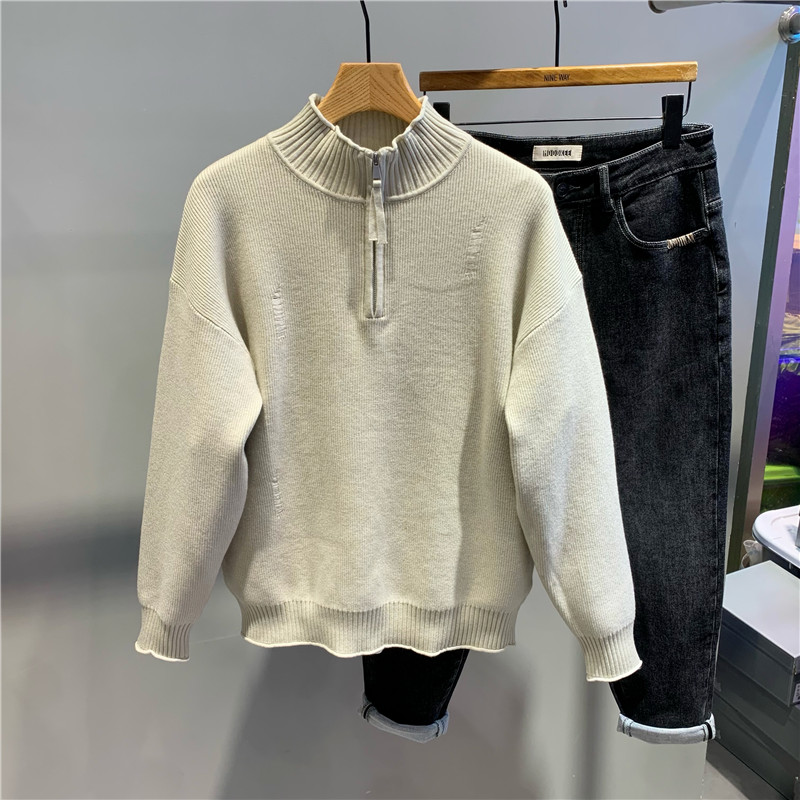 设计感刮破半拉链套头毛衣