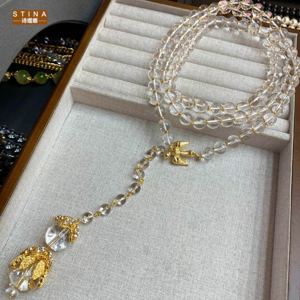 STINA复古10M白水晶长款飞鸟吊坠
