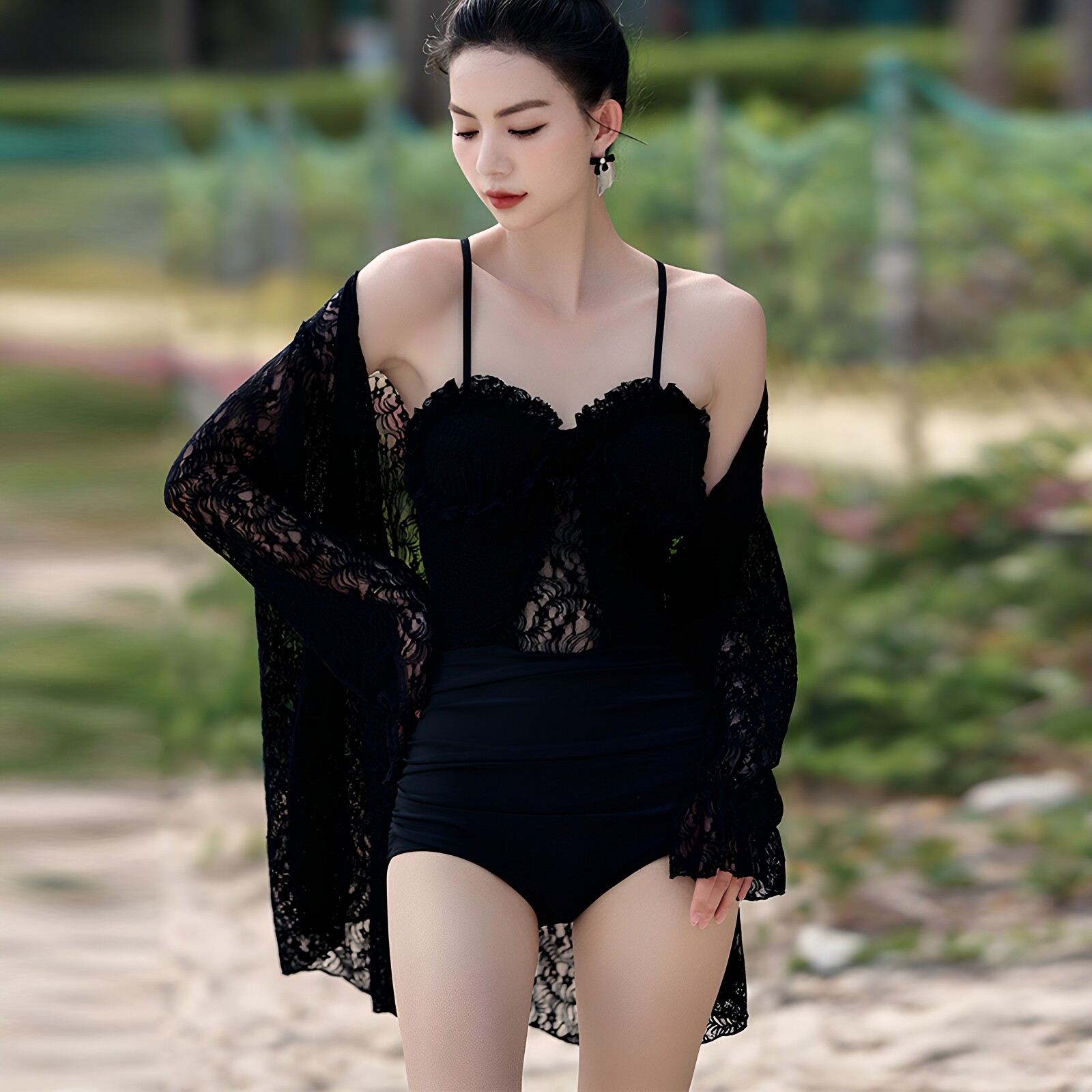 泳衣女性感2026新款爆款长袖时尚高级感显瘦遮肚连体温泉度假泳装