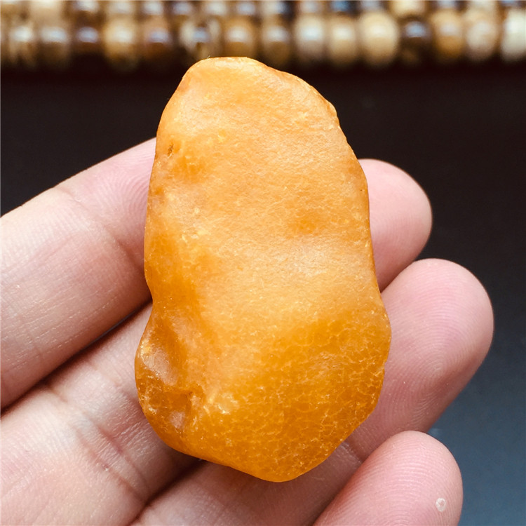 波罗的海琥珀蜜蜡原矿鸡油黄把件