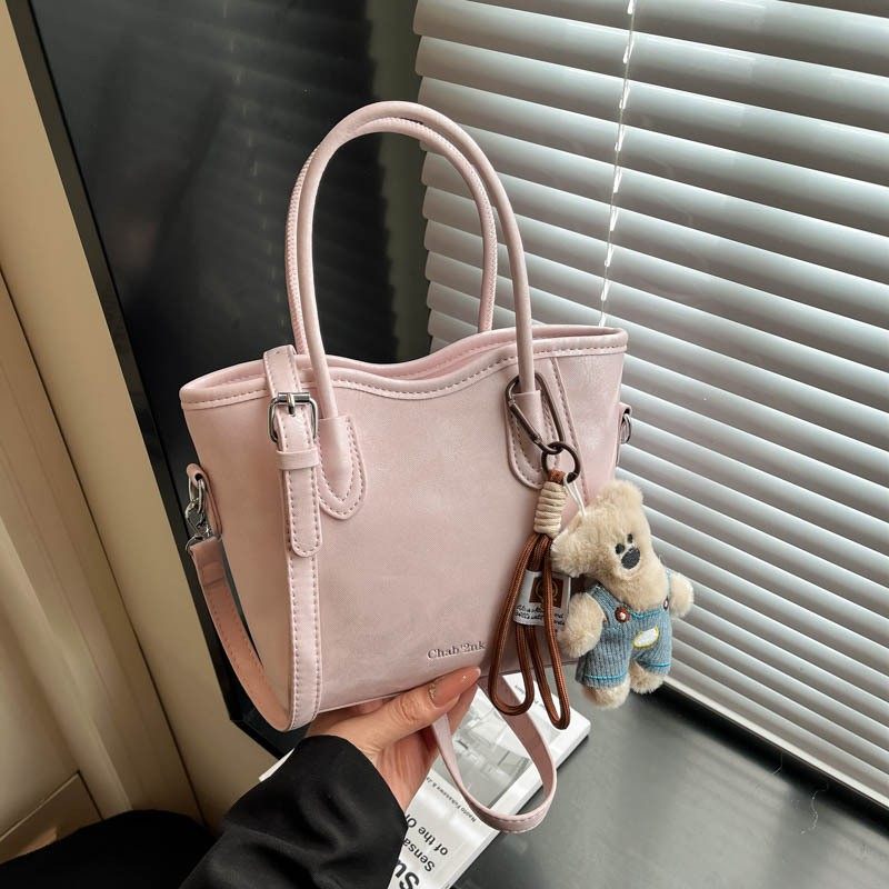 韩版小众设计纯色气质休闲水桶包包女上班通勤2025新款单肩斜跨包