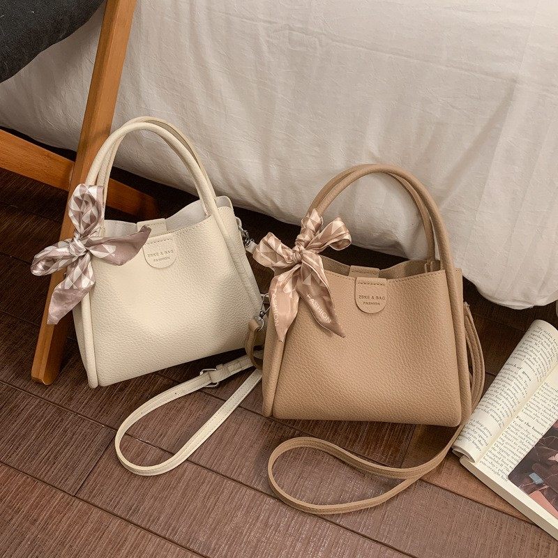 高级质感手提水桶包2025冬季时尚简约单肩包通勤软皮斜挎包女,箱包皮具/热销女包/男包,胸包,淘宝优惠券,粉丝福利购,淘宝优惠卷