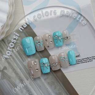 Baby 浅蓝色蝴蝶结拼钻夏天清爽短甲手绘穿戴甲美甲 blue