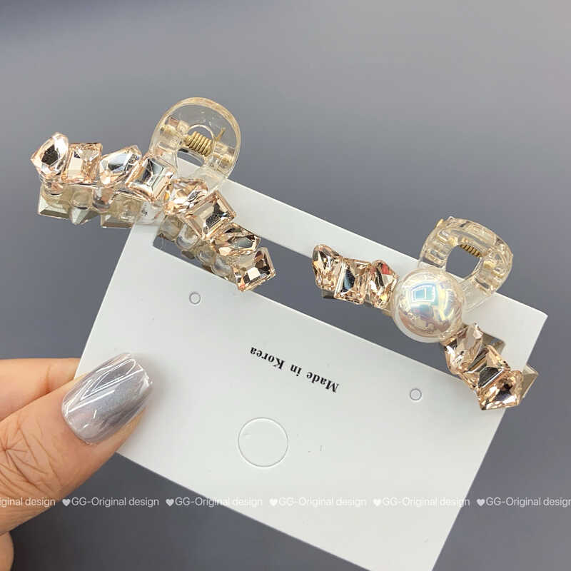 气质简约珍珠亚克力抓夹女半