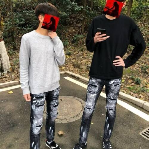 高版泼墨假破洞修身宽松牛仔裤