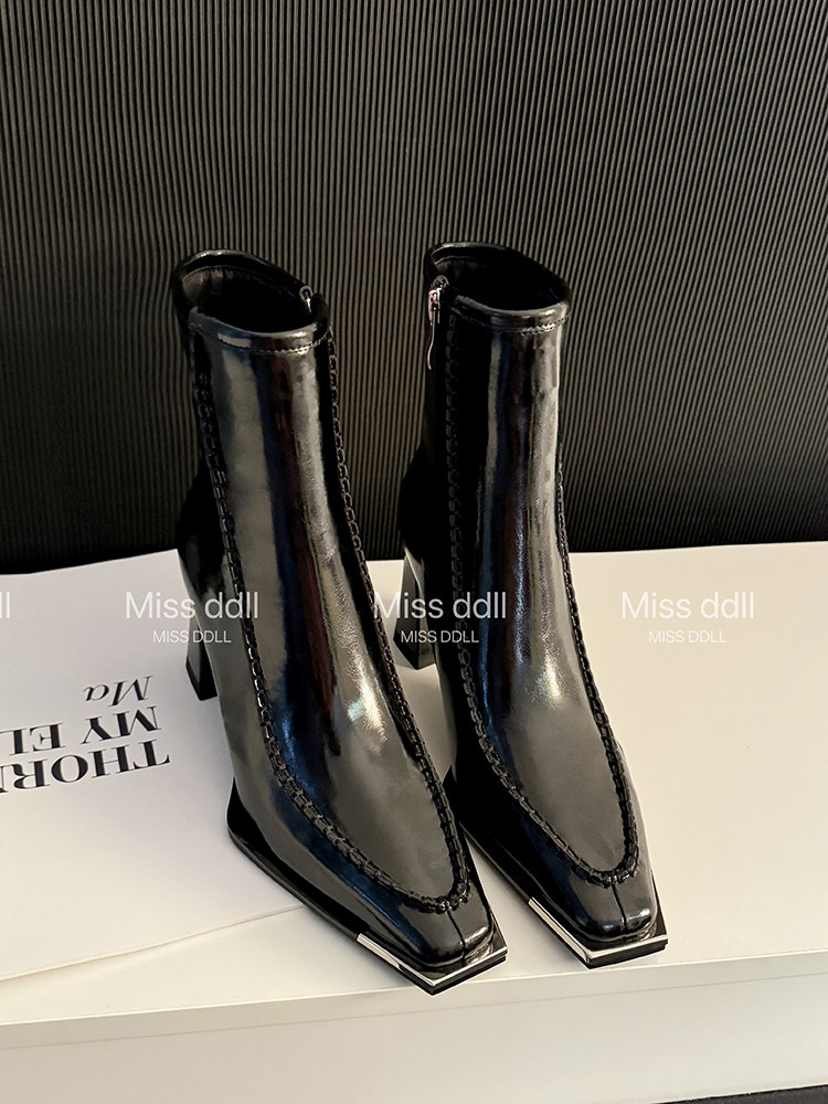 Black glossy pointed-toe ankle boots with block heels