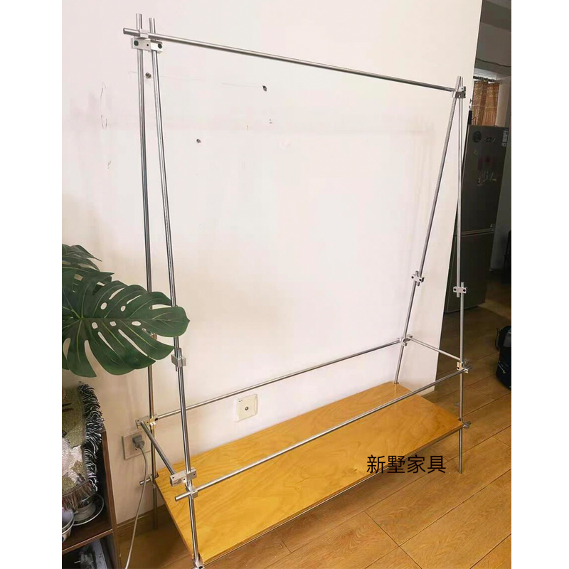 简约金属衣架设计师光轴挂衣杆小户型家用衣架桦木海洋板收纳架子