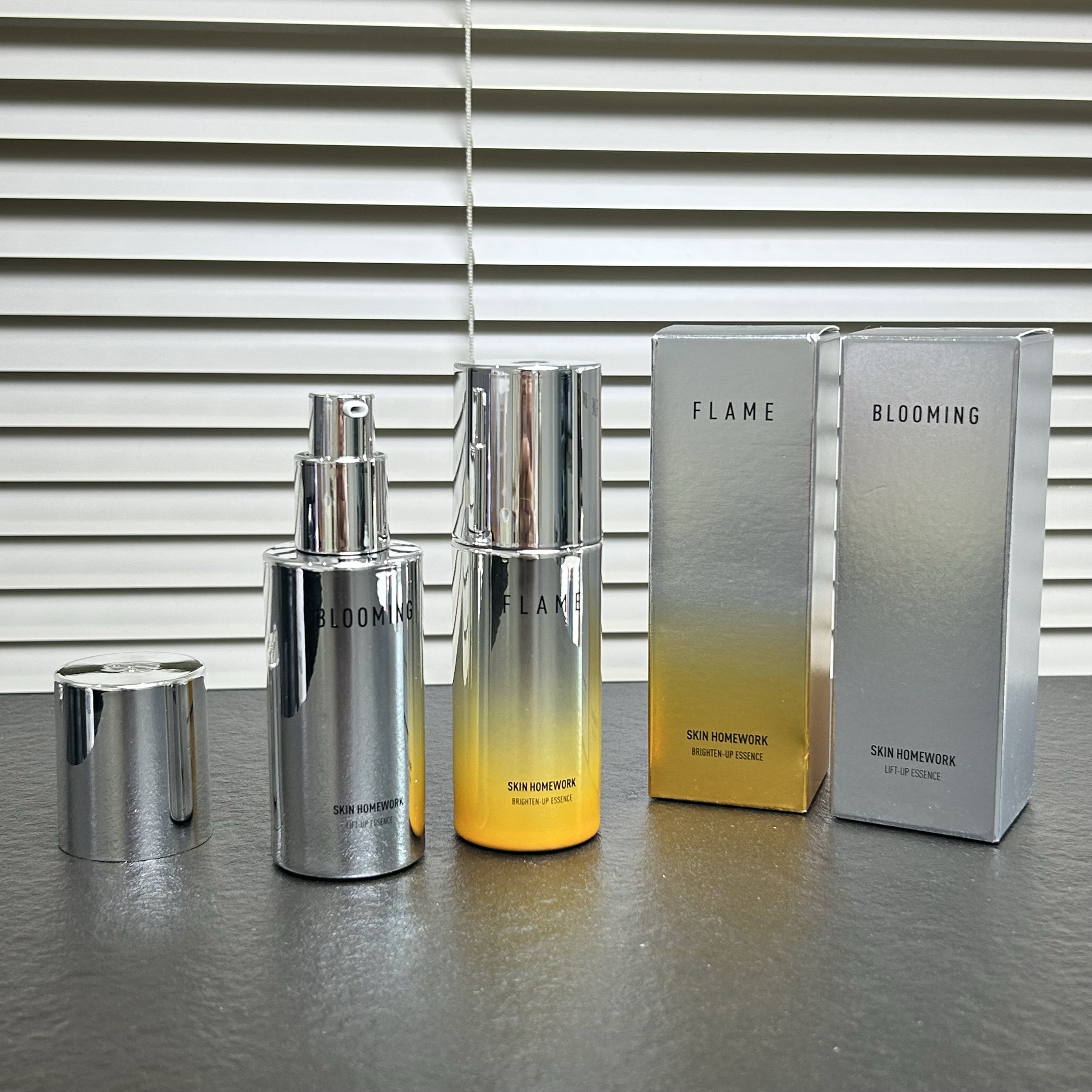 美国小橙瓶银瓶抗氧紧致精华液