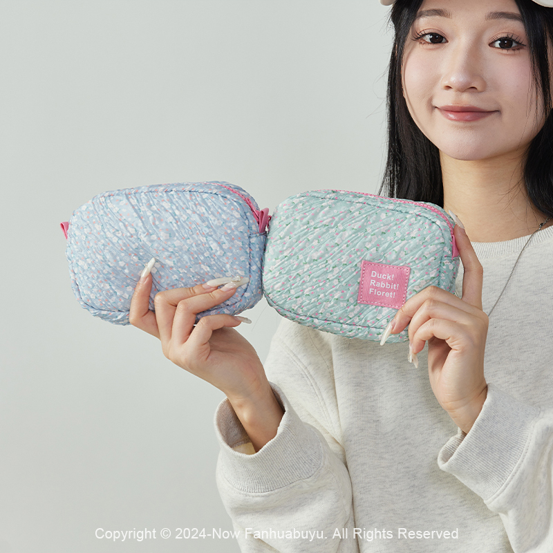 梵花不语碎花奶fufu收纳手拿包