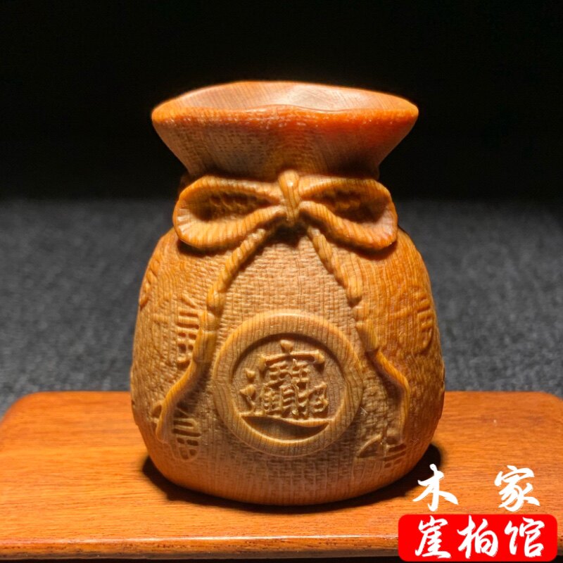 天然崖柏陈化料福袋手把件木雕钱袋挂件高油高密福财袋盘玩工艺品