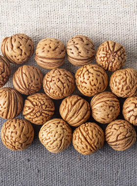 2025年野生桃核手串料桃胡近圆料脑纹打孔和不打孔的桃核拍打袋