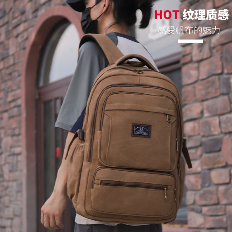 复古帆布双肩包旅行电脑包加厚大容量男士耐磨行李包户外登山背包